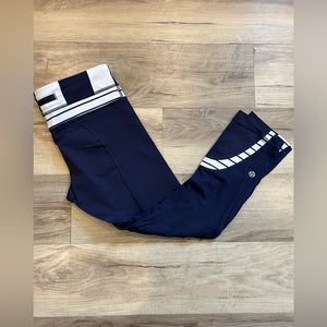 Lululemon dark navy blue with white accent Capri length legging w/ waist pocket